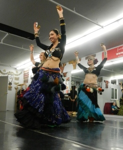Gorgeous Asian bellydancer dressed in traditional attire
